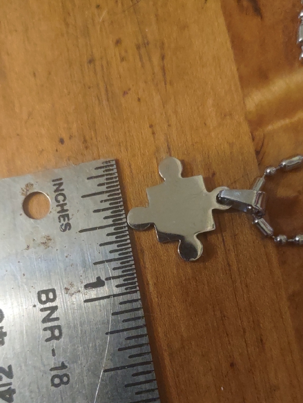 Silver Toned Puzzle Piece Pendant Necklace - Picture 6 of 7